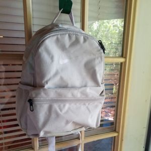 Light Pink Nike mini backpack.
